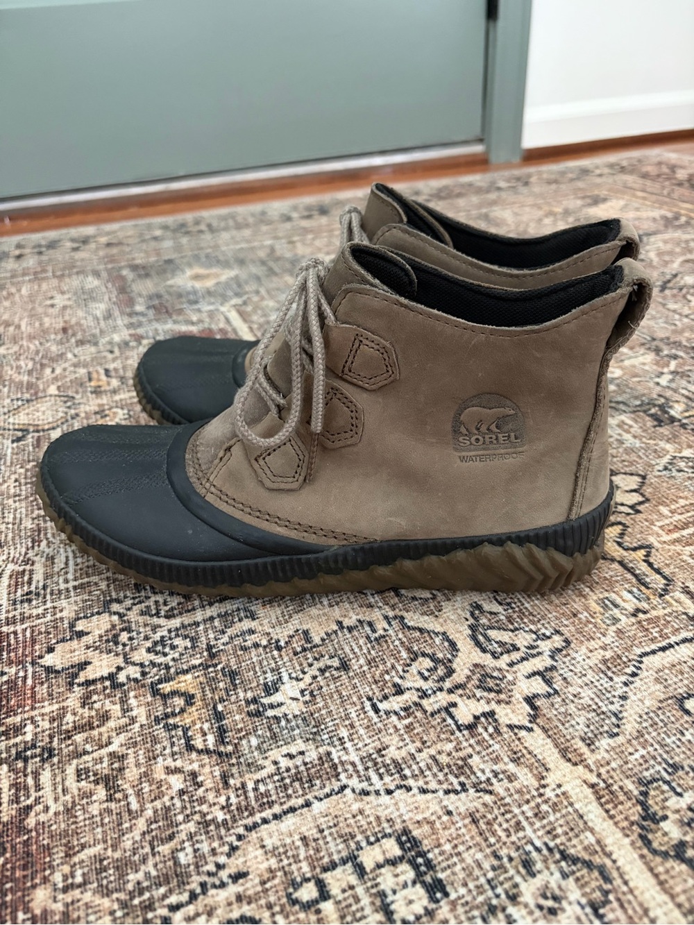 Sorel women’s Out N About Plus Duck Boots in brown, size 9